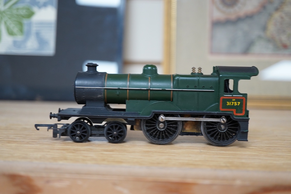 A quantity of 00 gauge model railway by Hornby, Tri-ang, etc. including nineteen locomotives in BR, GWR, LMS, etc. liveries, together with a boxed electrically operated turntable (R070), a terraced house (R8621) and a ga